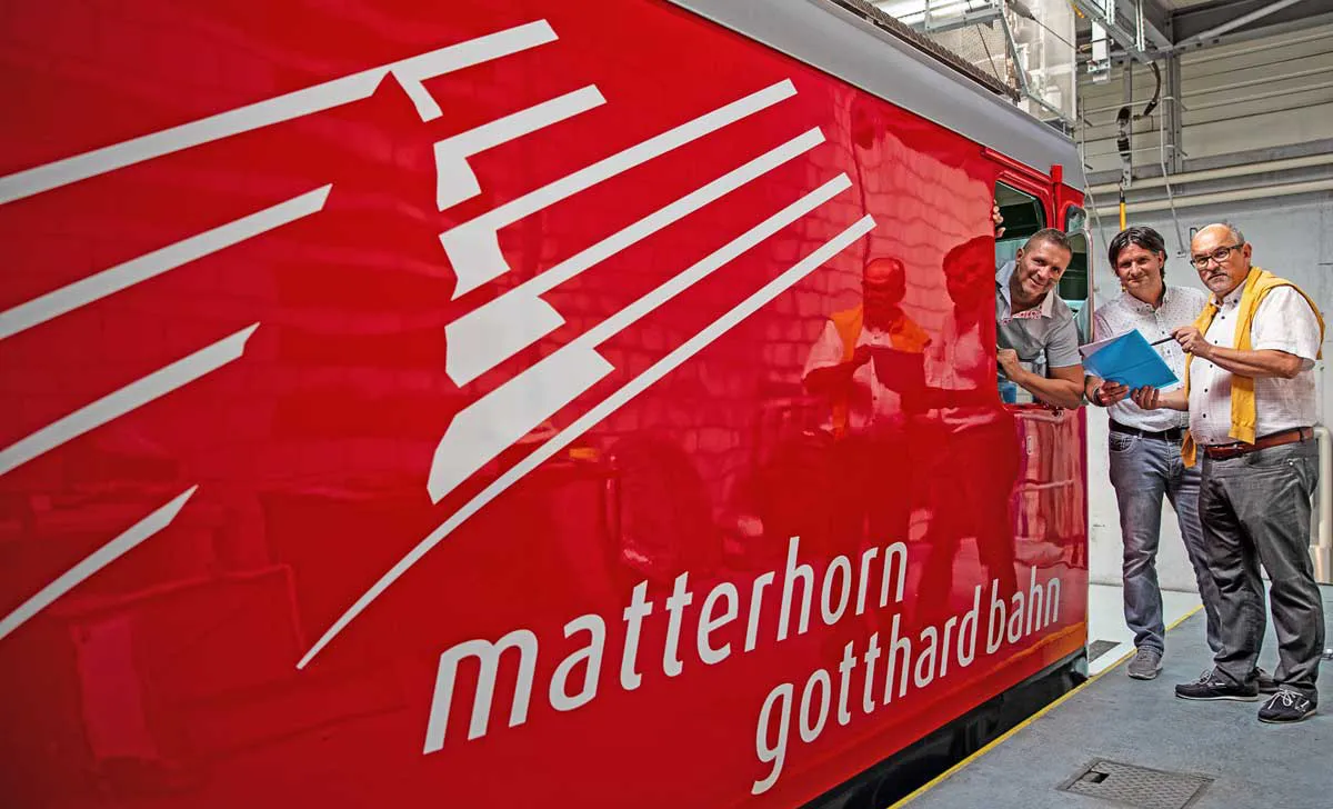 Testimonial Photo with Matterhorn Gotthardbahn next to a Train